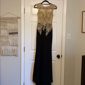 Elegant gold and black formal gown great for prom